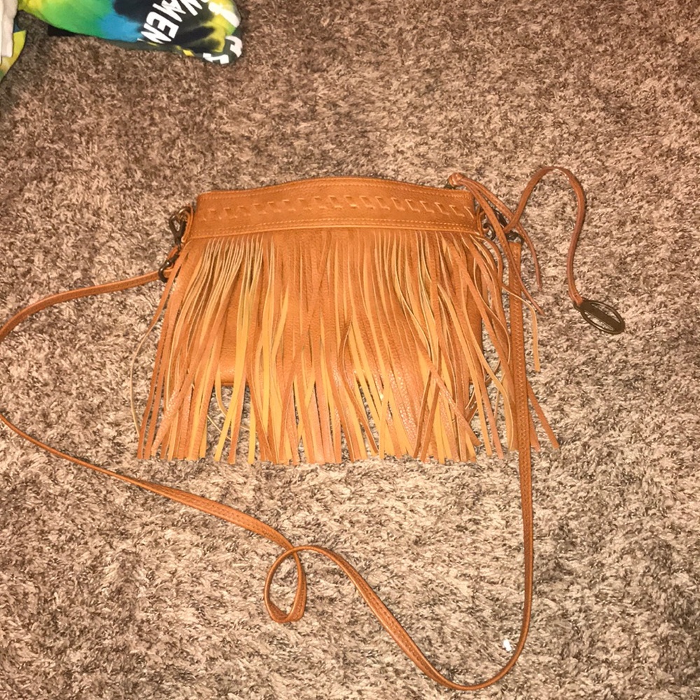 Carlos Santana cross body bag